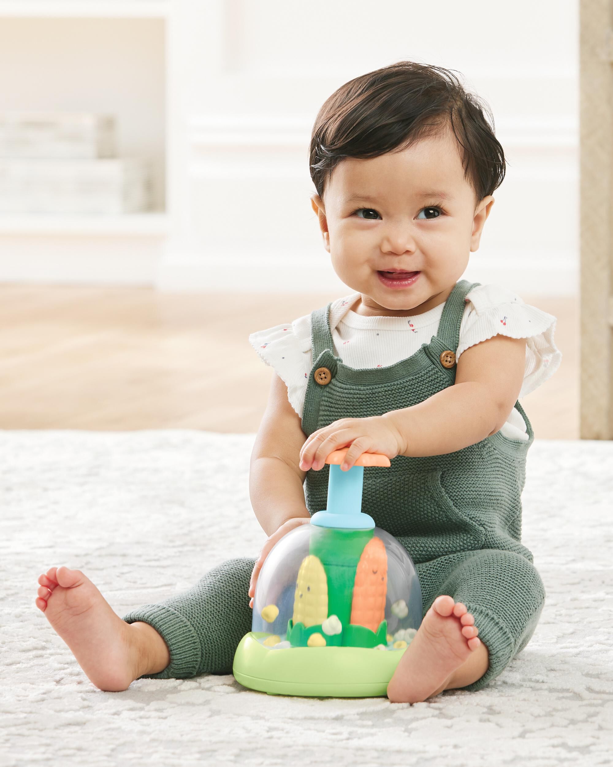 Carter's Farmstand Push & Spin Baby Toy